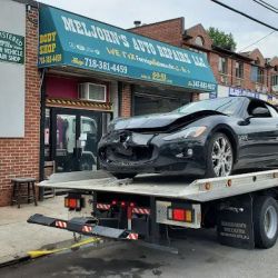 TOWING + BODY SHOP + AUTO REPAIR = MELJOHNS ico