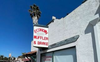 economy muffler svc.