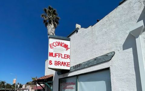 economy muffler svc.