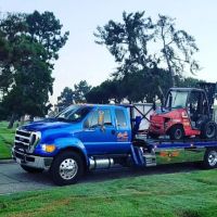 Clark's Towing & Equipment hauling