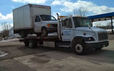Low Dollar Companies LLC / Towing Road Service