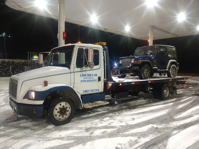 Low Dollar Companies L.L.C. / Towing Road Service 1