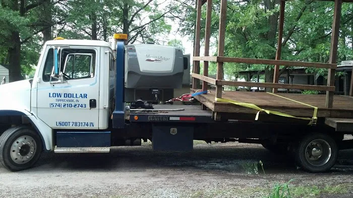 Low Dollar Companies L.L.C. / Towing Road Service 0