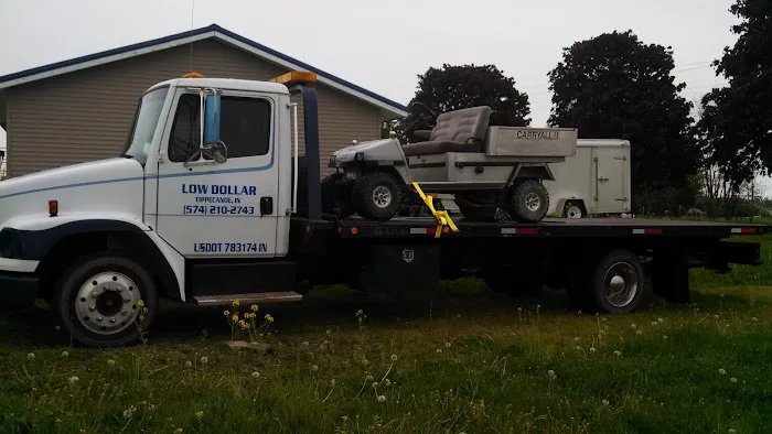 Low Dollar Companies L.L.C. / Towing Road Service 3