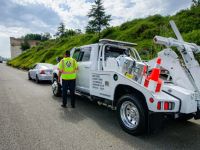 How to Request a Tow Truck Service for a Vehicle Stuck on the Freeway