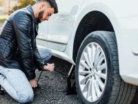 How to Change a Flat Tire and Get the Right Towing Service