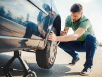 How to Properly Place Warning Signs When Changing a Tire