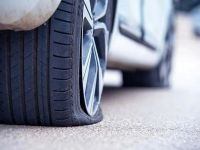 Does Towing Assistance Cover Vehicles with Flat Tires? Everything You Need to Know