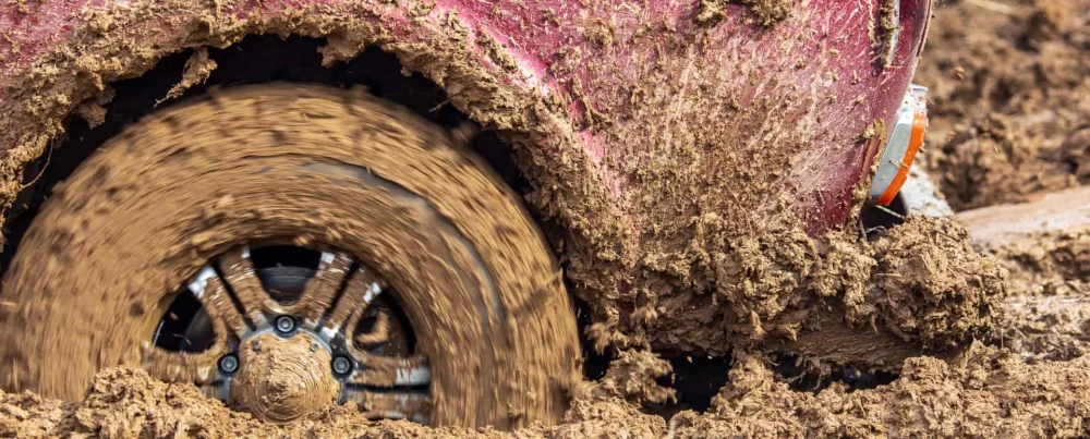 What to Do When Your Car Tires Get Stuck in Mud: A Complete Guide