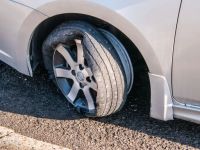 Roadside Assistance for Tire Blowouts: How to Stay Safe and Get Help Fast