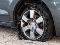 Can a Sudden Flat Tire Cause Damage to Your Car’s Brake System?