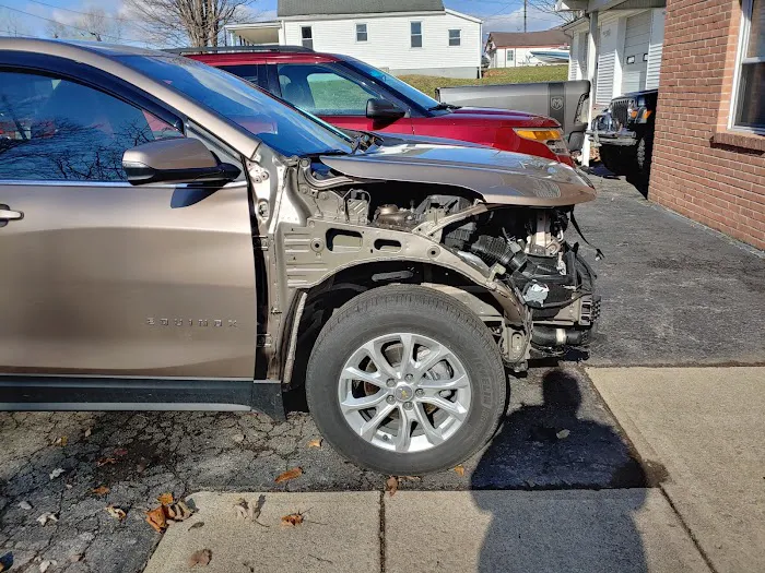 Jason Pitzer's Knisley's Body Shop, LLC. 2