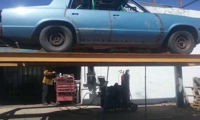 Rock Solid Mufflers & Spray-On 9