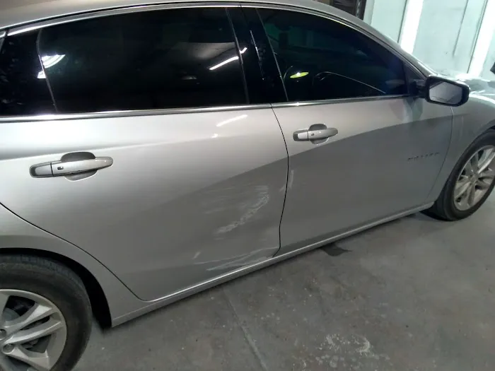 Tournoux's Body Shop 1