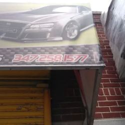 El Garage Auto Parts ico