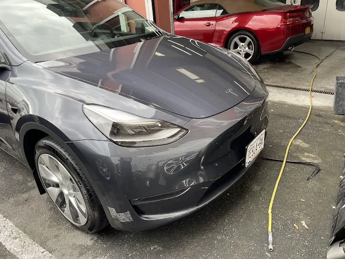 Ozzie auto body Inc 2