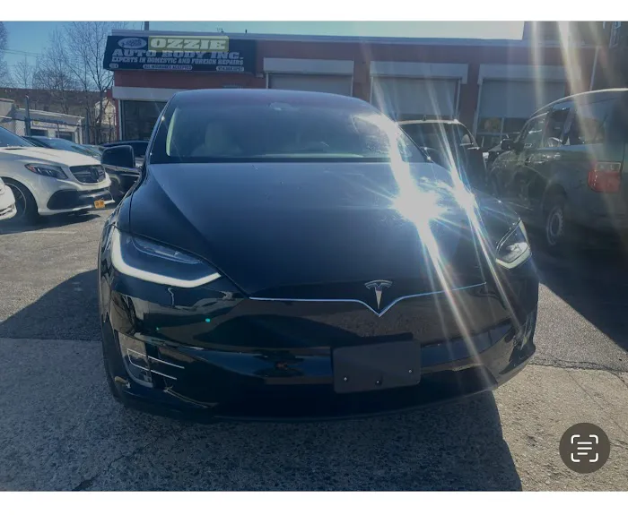 Ozzie auto body Inc 0