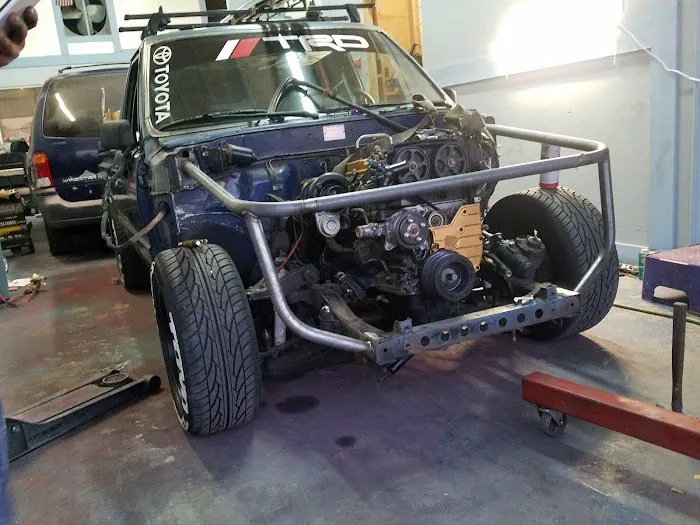 The Homie Greedie's Garage ( certified auto body and mechanic) 1