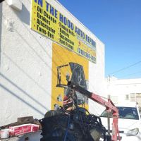 In the hood (of a car) auto repair