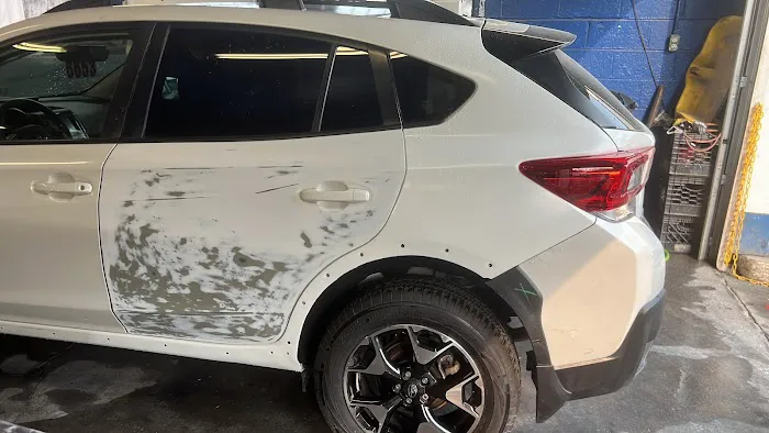 Mordan premier auto body LLC 0