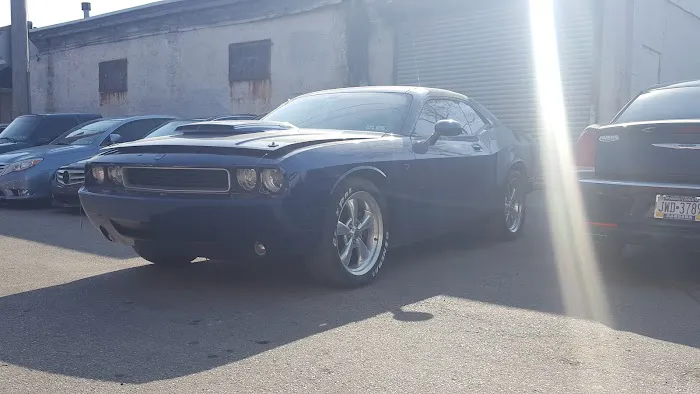 P L Auto Body Inc 1