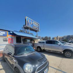 T P Auto Repair ico