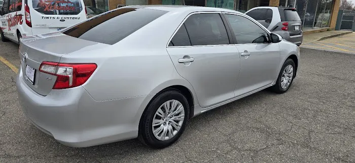 Xclusive tints & customz 0