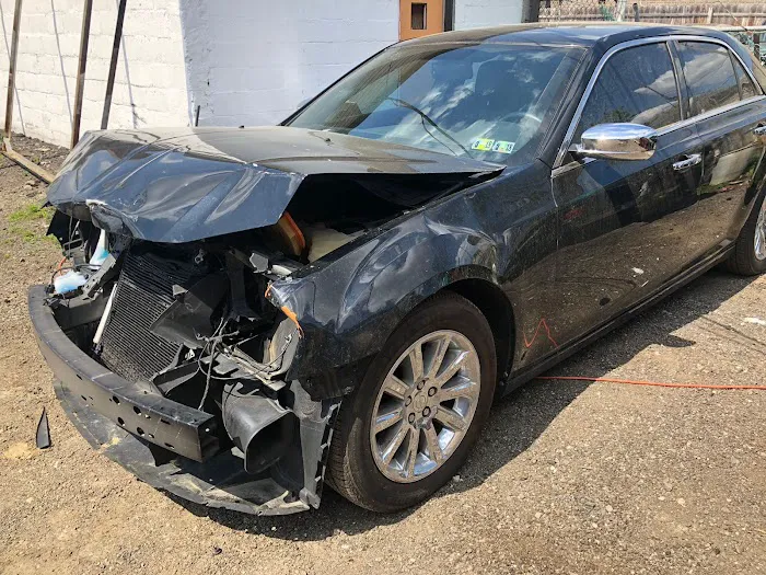 Rocky's Collision Inc 8