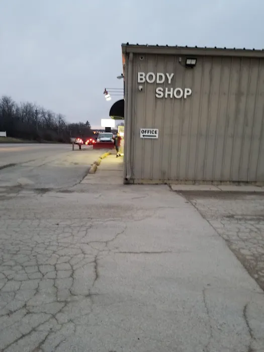Dundee Collision Inc. 1