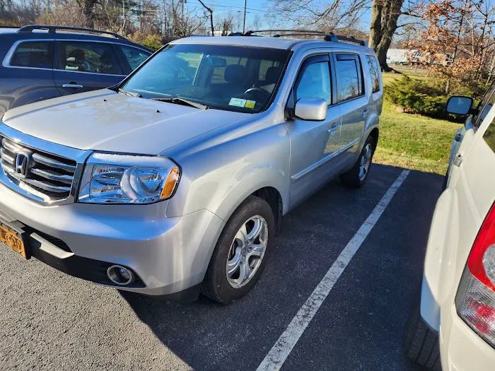 Eason' Auto Body Inc 1