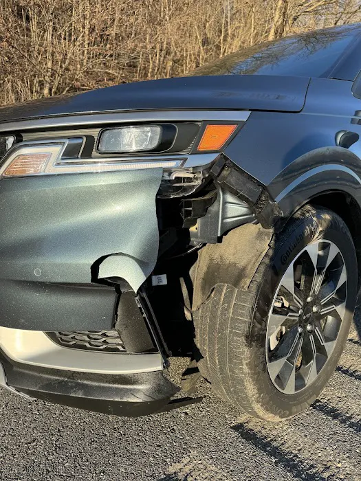 Monroe's Collision Inc. 7