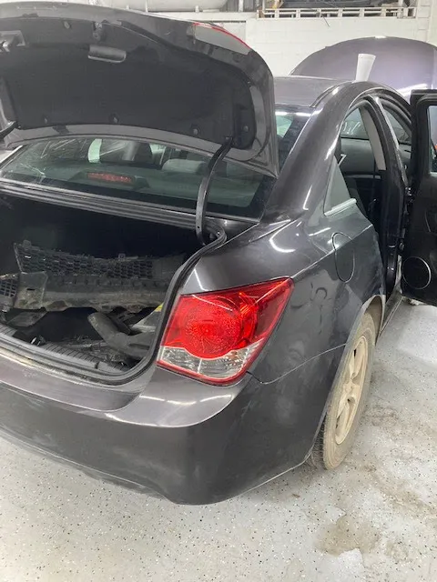 Tripp's Collision - Lansing 1