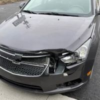 Tripp's Collision - Lansing
