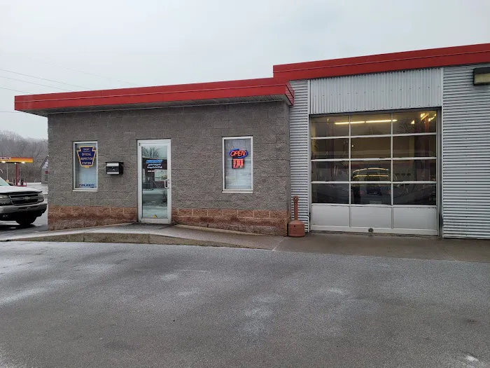 Wood's Garage Towing & Auto Body Repair, LLC. 1
