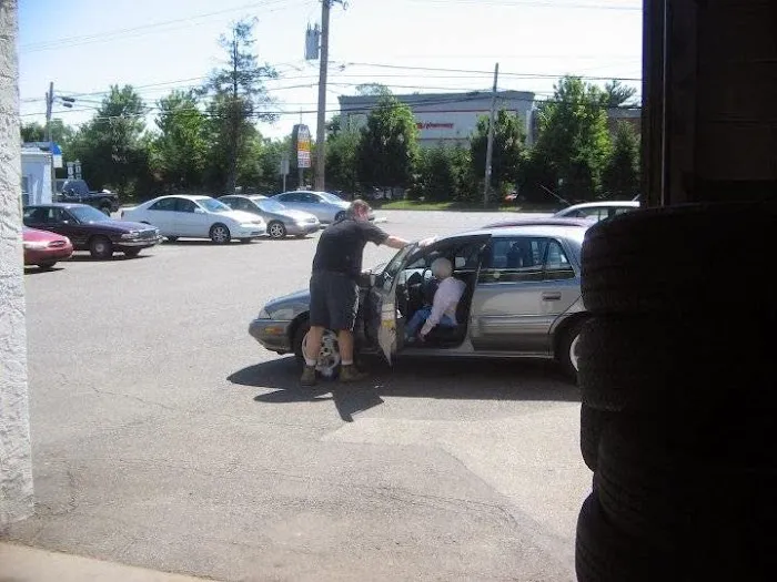 Qyst Tire & Automotive Service Centers 0