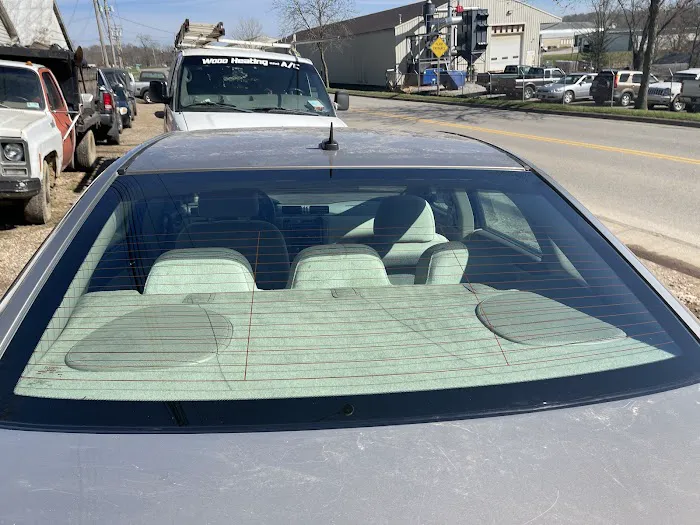 Sutton's Mobile Glass 0