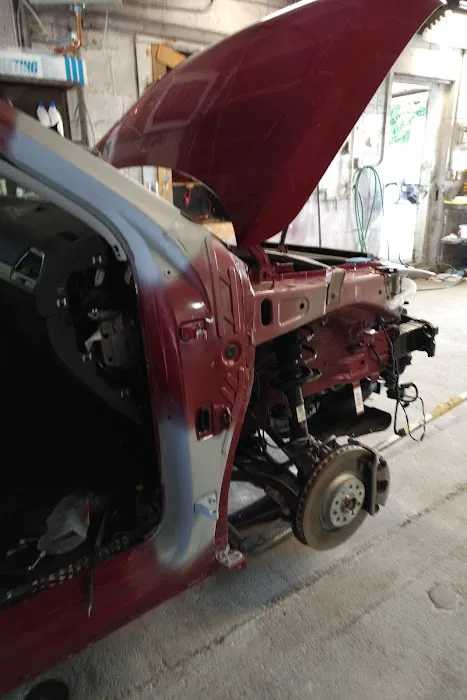 Venusti Auto Body & Towing 0