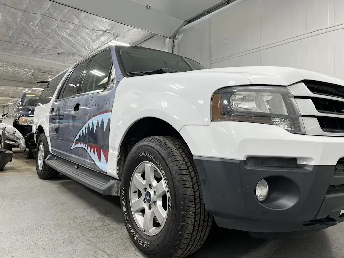 Carl's Body Shop & Towing 8