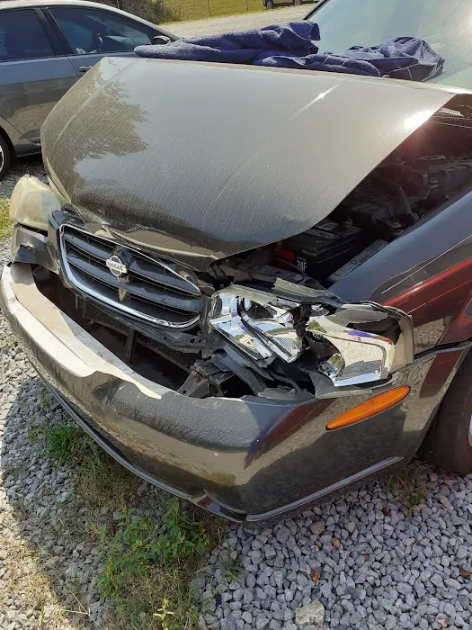 MaxXx'd Out Auto Body & Towing 8