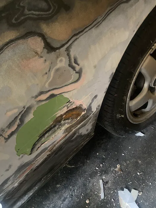 MaxXx'd Out Auto Body & Towing 9