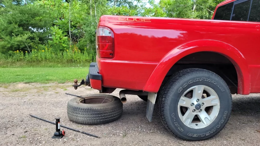 How to Safely Change a Tire on a Steep Road