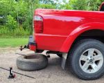 How to Safely Change a Tire on a Steep Road