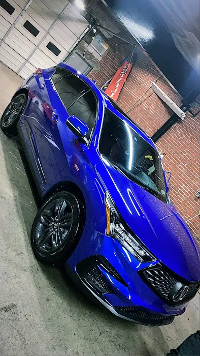 The shop detailing and tint 1