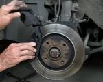 How to Deal with Brake Squeal or Grinding Noises: Causes & Solutions