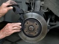 How to Deal with Brake Squeal or Grinding Noises: Causes & Solutions