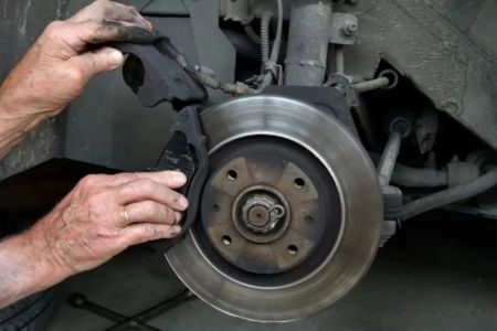 How to Deal with Brake Squeal or Grinding Noises: Causes & Solutions